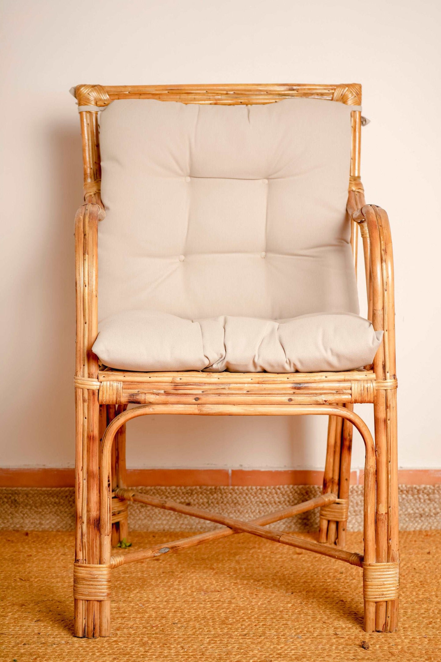 Wicker Chair with a canvas cushion seat and a back rest