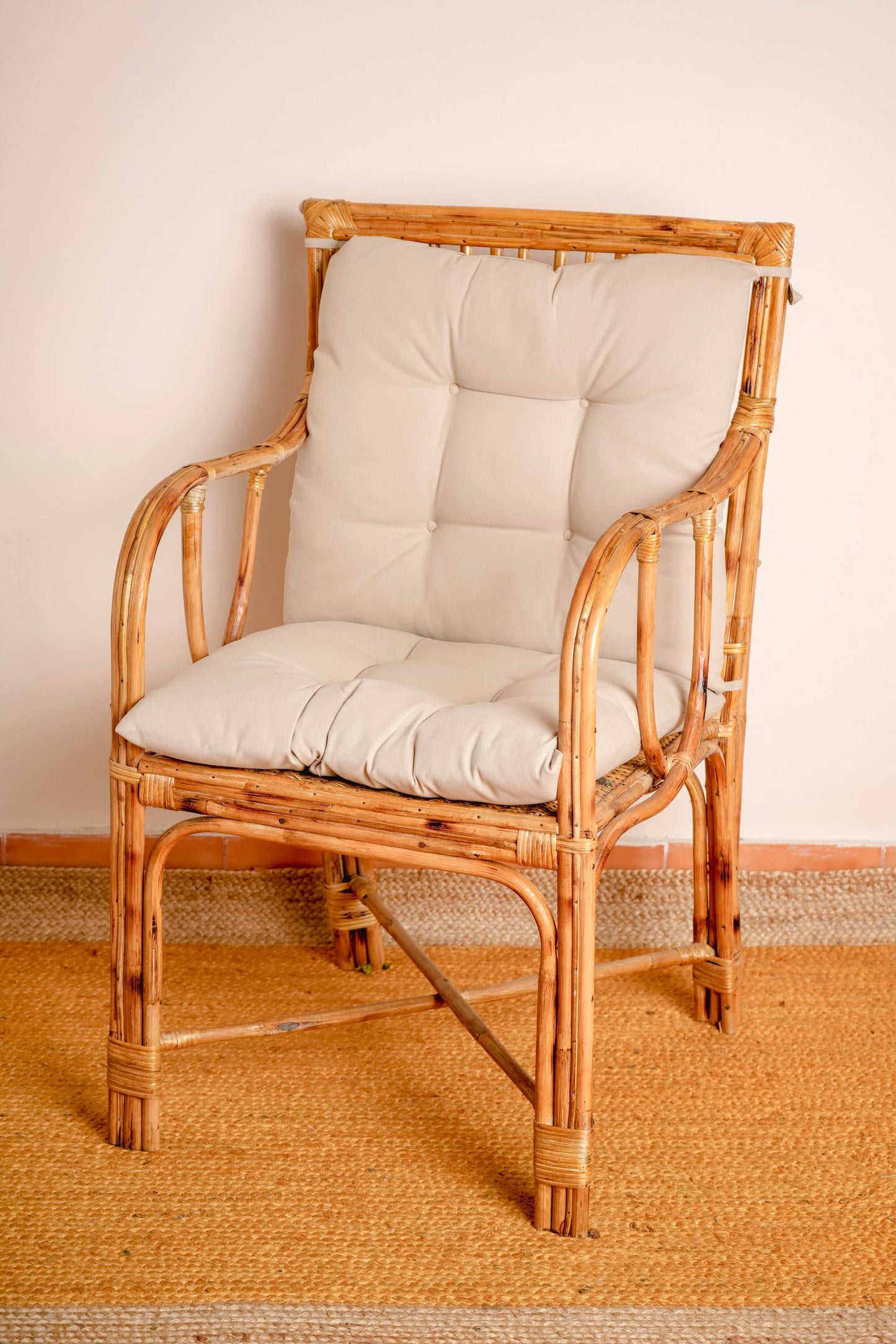Wicker Chair with a canvas cushion seat and a back rest