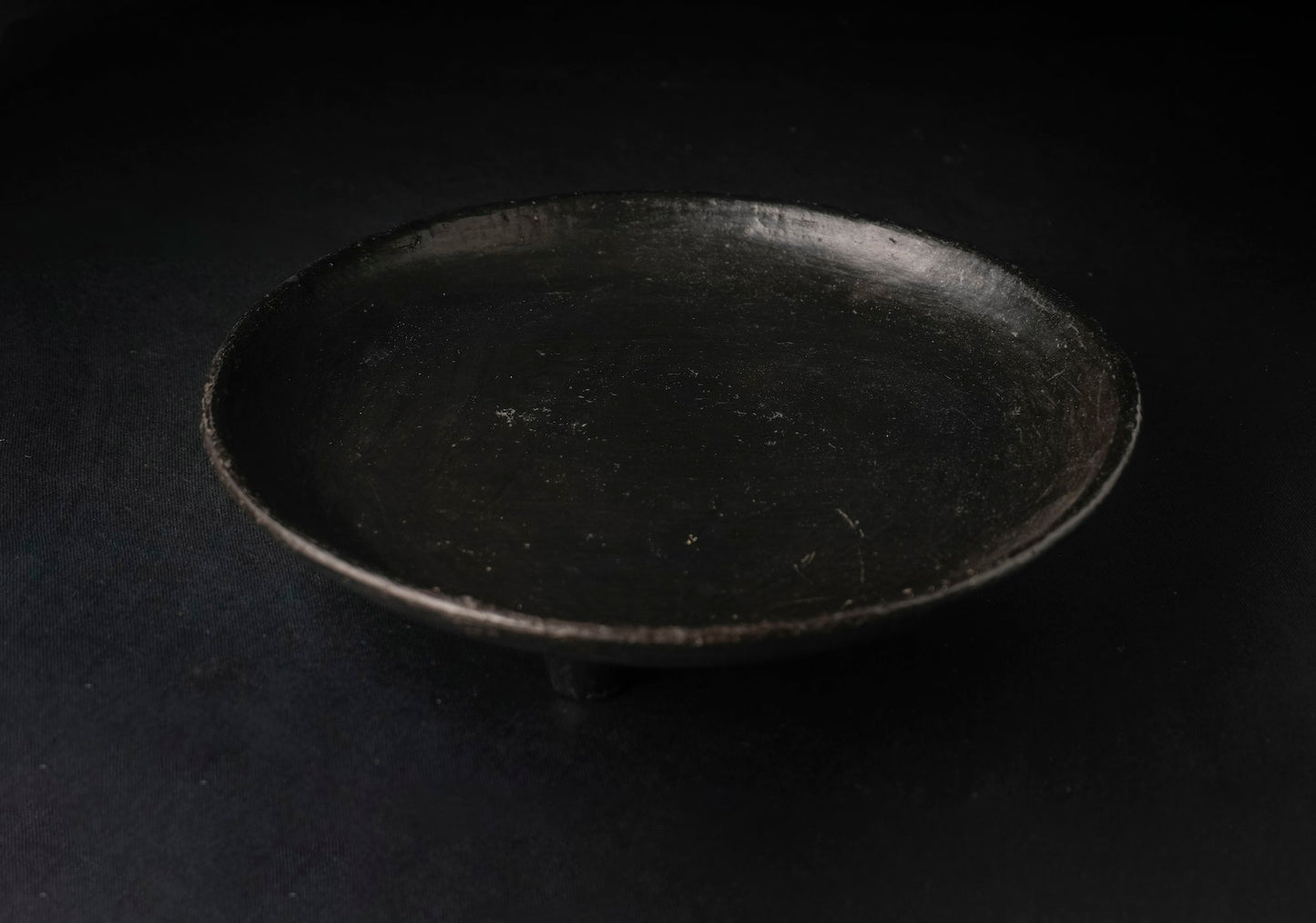 Longpi Black Pottery Stoneware multipurpose serving platter with a trivet leg